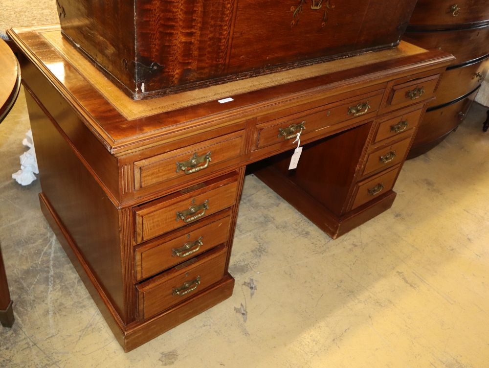 A late Victorian walnut pedestal desk, W.138cm, D.75cm, H.78cm